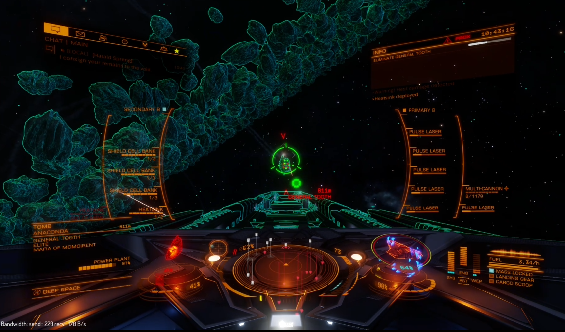 Cockpit view with orange instrument panels, a centred target and cyan outlines around nearby asteroids.