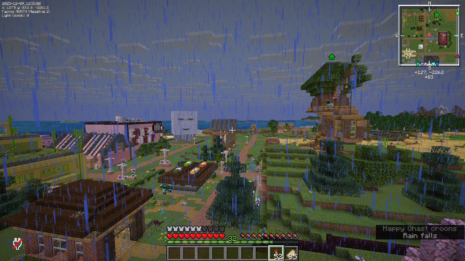 Minecraft town with happy ghast