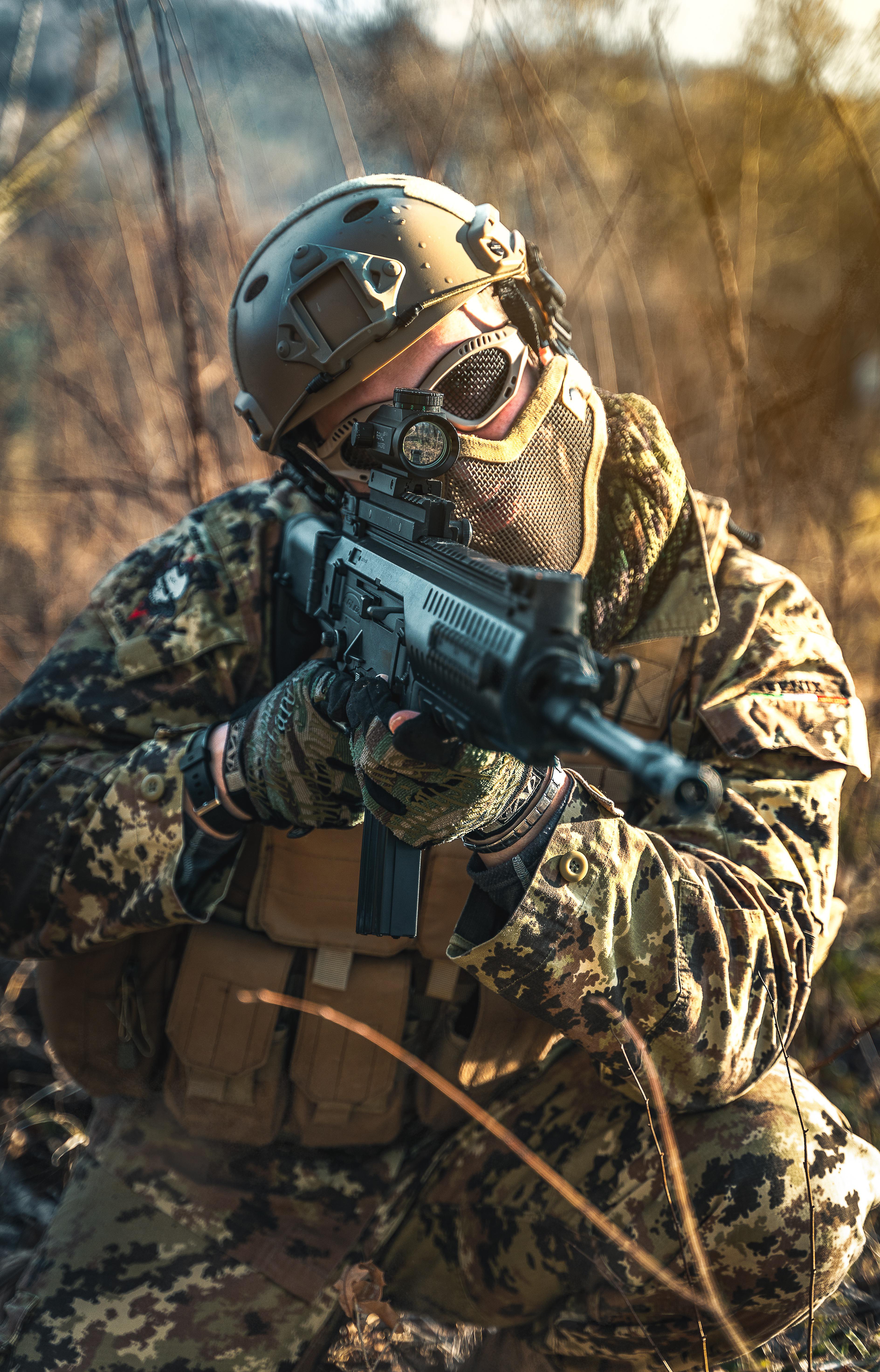 Marksman.jpg A special forces marksman in camouflage, ensconced in the bushes