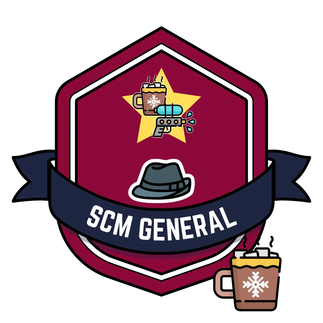 Red badge with fedora, gold star, SCM logo, and blue ribbon that says SCM General. A cocoa sits beside it. 