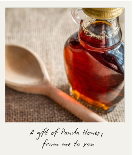 panda-honey.webp A spoon and a jar of maple syrup; caption