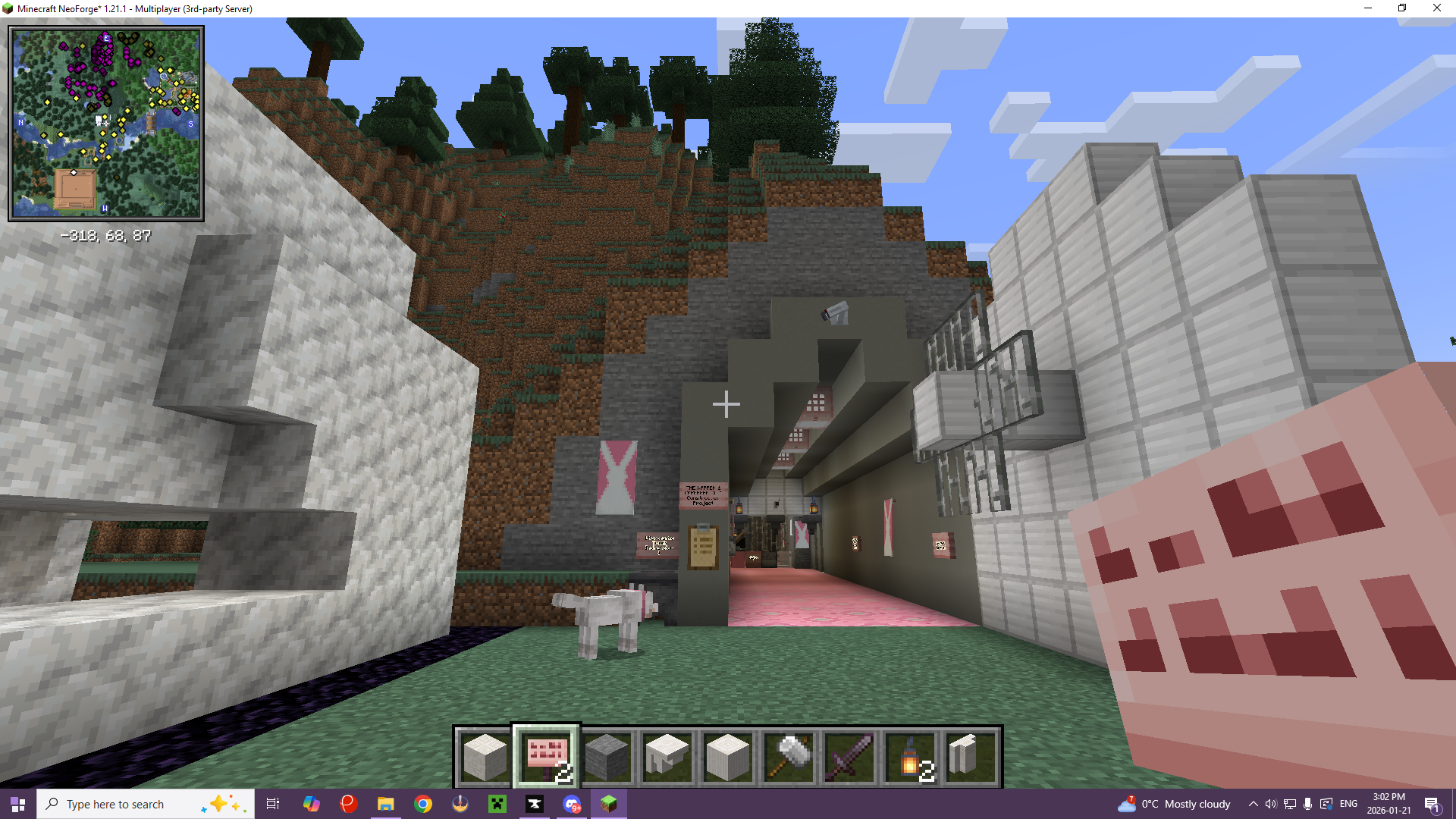 A Minecraft screenshot of an entrance into a fortress inside a mountain, with a blast door and a pet wolf, showing where to find Clipboard Project Notes