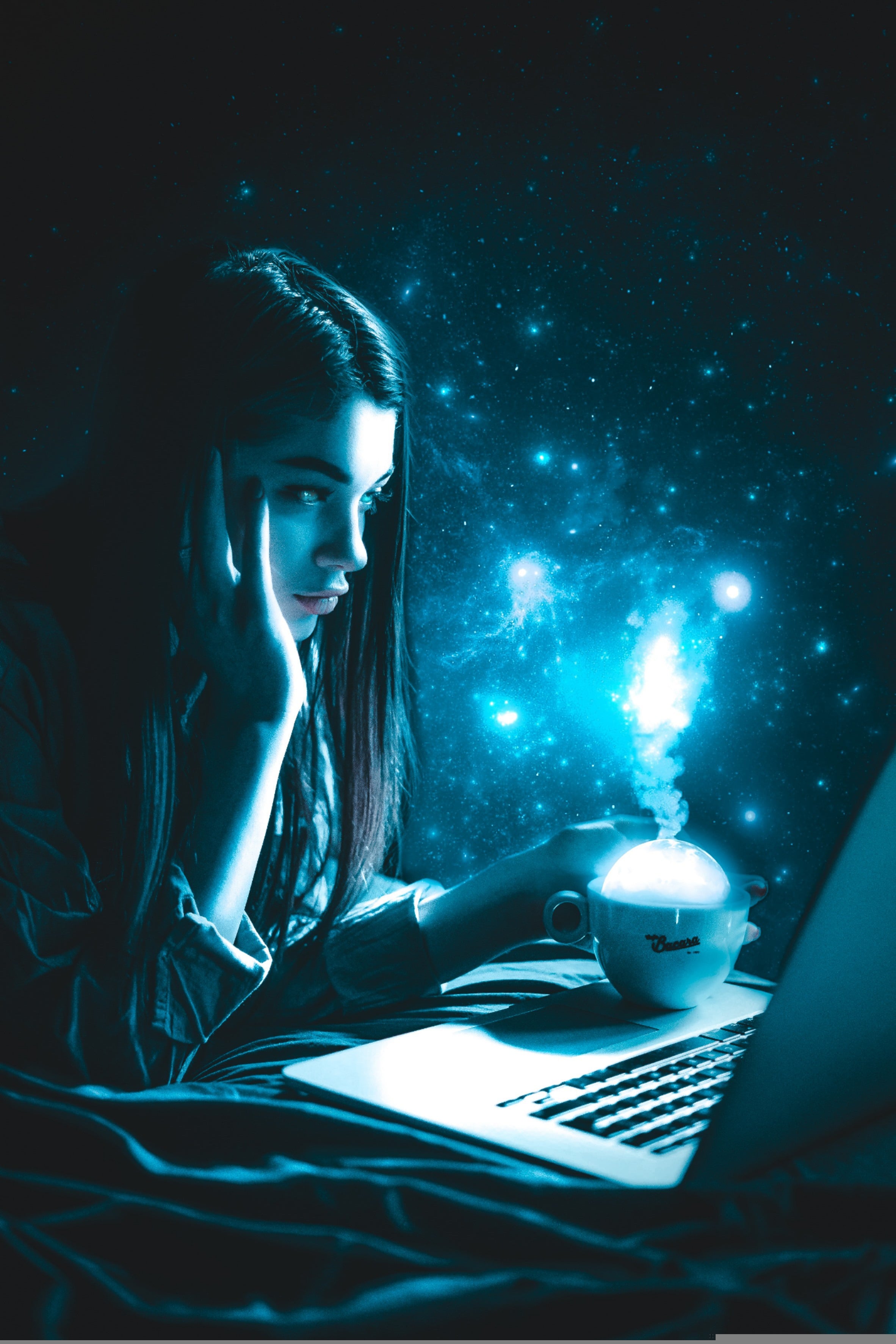 stars-writing.jpg A young, dark-haired woman writing on a laptop against a spectacular starscape, with a steaming latte at her side