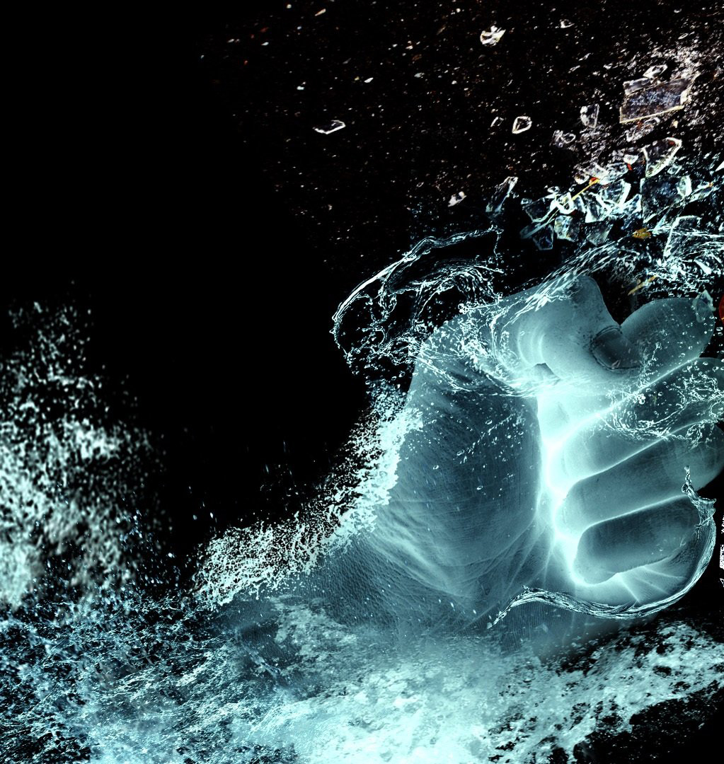 A large watery fist punching through water